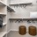 walk in closet with shelves and hanging racks