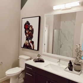 Curate at Orchard Town Center spacious single vanity bathroom with walk in closet